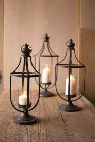 SET OF THREE METAL LANTERNS WITH GLASS INSERT