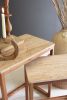 SET OF 2 NESTING TRAVERTINE SIDE TABLES W ACACIA WOOD BASES