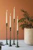 SET OF FOUR FORGED IRON TAPER CANDLE HOLDERS - GREEN PATINA